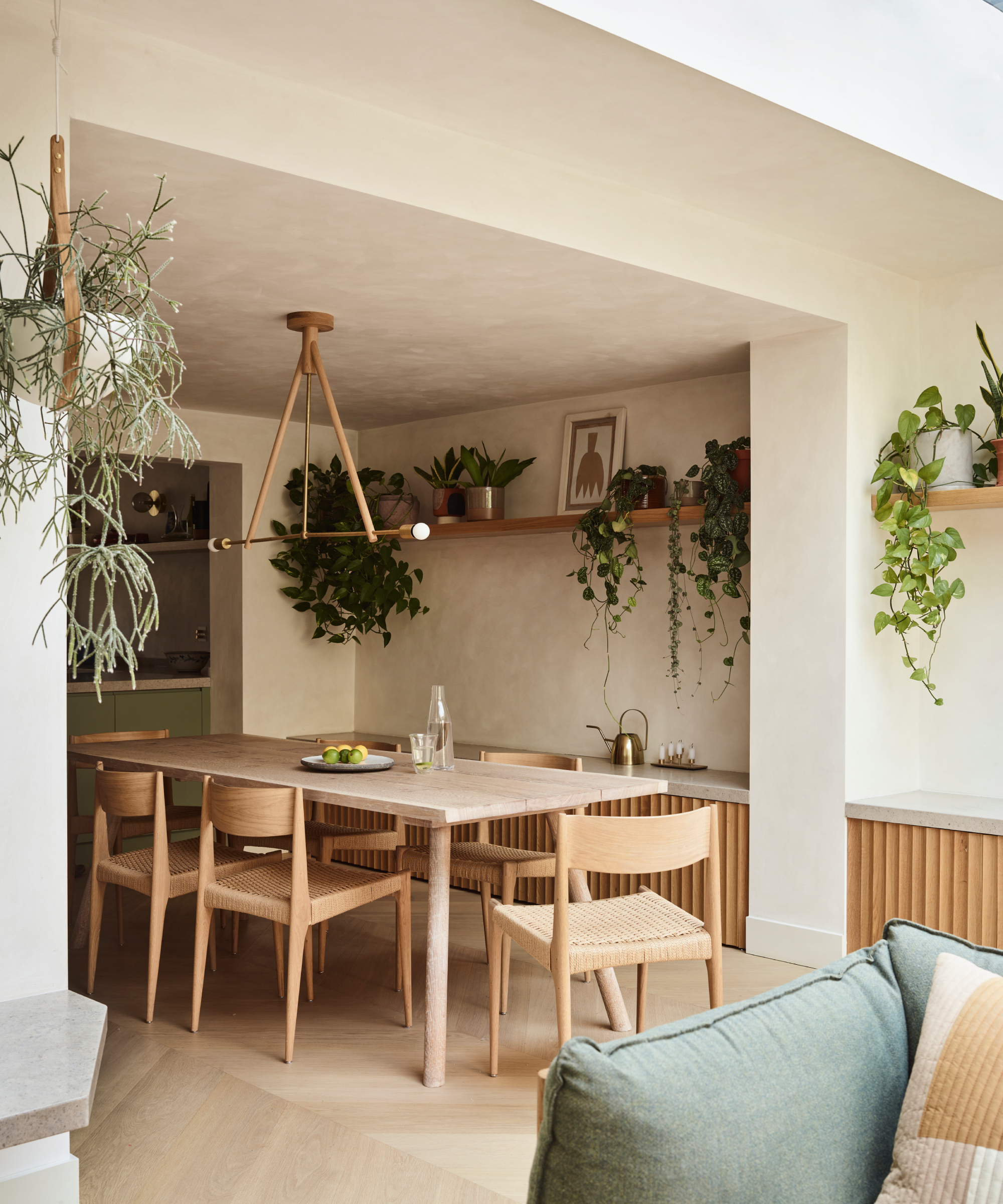open plan space with opening created between dining and living areas