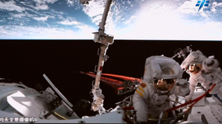 Shenzhou 14 astronauts Chen Dong and Liu Yang work outside the Wentian module of China's Tiangong space station during a six-hour spacewalk on Sept. 1, 2022.