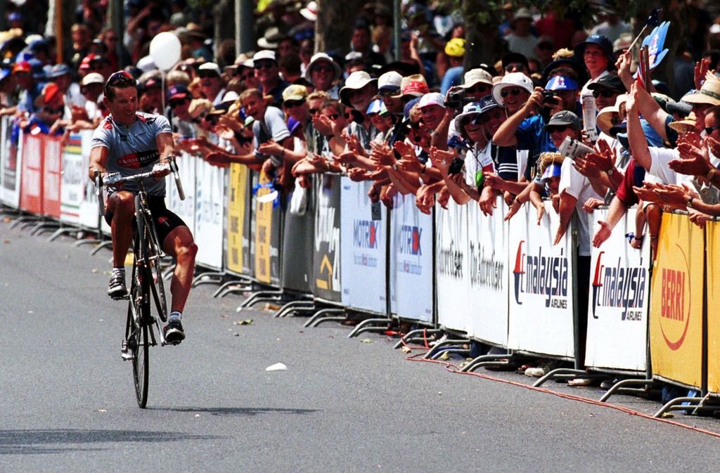 A wheelie from Robbie McEwen gets the crowd going