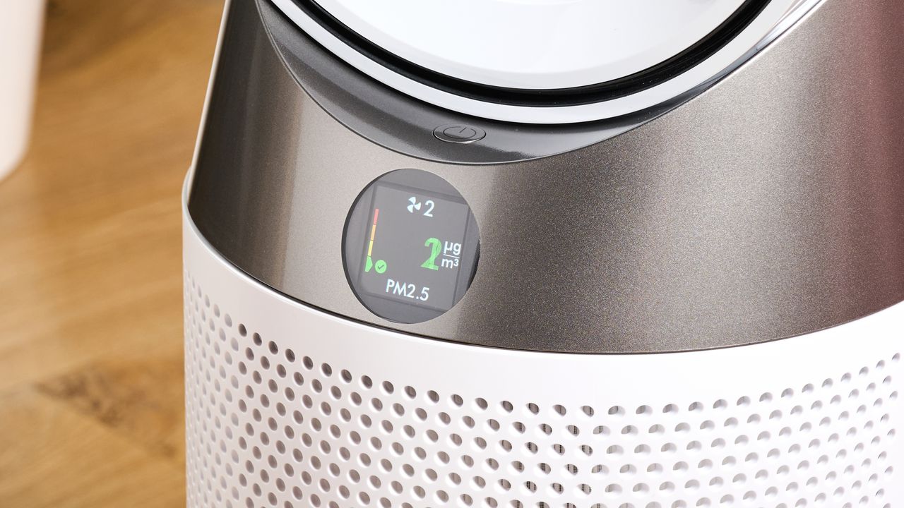 The circular screen of the Dyson HP10 is showing a reading of two micrograms of PM2.5 per cubic meter.