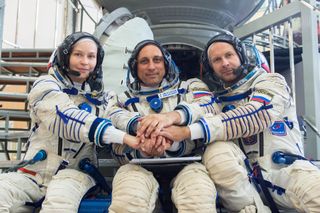Actor Yulia Peresild (left), cosmonaut Anton Shkaplerov (center) and director Klim Shipenko (right) are scheduled to launch toward the International Space Station on Oct. 5, 2021.