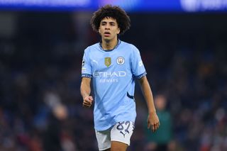 Rico Lewis of Manchester City during the UEFA Champions League 2024/25 League Phase MD5 match between Manchester City and Feyenoord at City of Manchester Stadium on November 26, 2024 in Manchester, England.