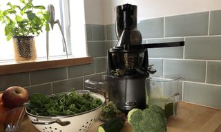 Kuvings EVO820 Evolution Cold Press Juicer on a kitchen countertop