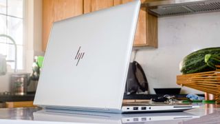 HP EliteBook 840 Aero G8 open on counter