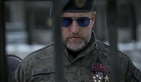 War for the Planet of the Apes Woody Harrelson looking down at the cells