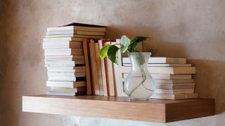 A floating wooden bookshelf
