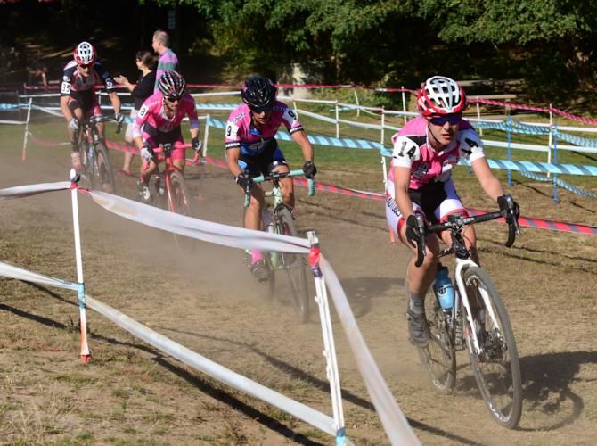Chloe Woodruff (Stans NoTubes) leading a group of pink chasers on lap three
