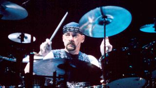 Rush’s Neil Peart onstage in 1996