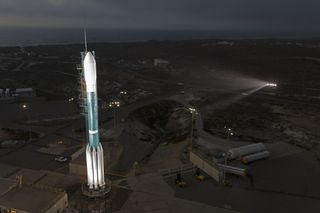 A United Launch Alliance Delta II rocket stands atop Space Launch Complex 2 on Nov. 13, 2017 as the pad gantry is rolled back in preparation for the launch of the Joint Polar Satellite System 1 weather satellite. An attempted launch on Nov. 14 was delayed