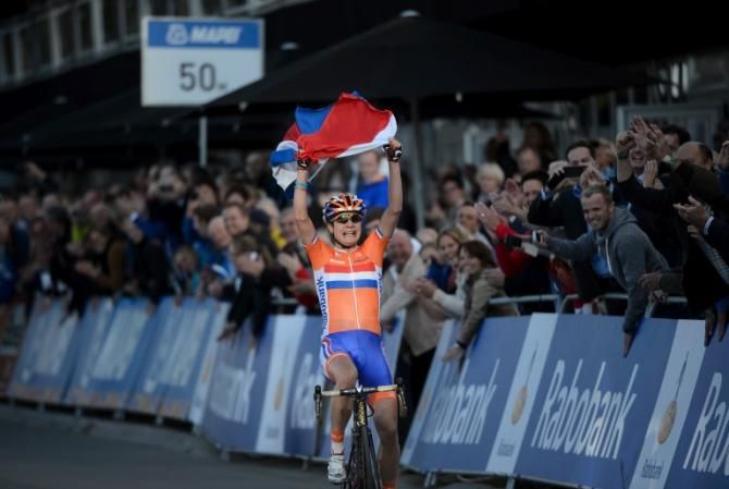 Marianne Vos took a memorable road race world title on home soil.
