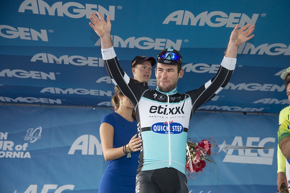 Mark Cavendish (Etixx-Quick Step) waves from the crowd