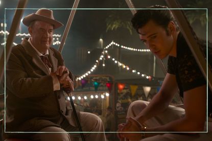 Tom Hanks as the Colonel (left) talking to Austin Butler as Elvis (right) while sat on a ferris wheel