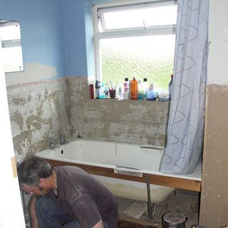 under construction bathroom with bathtub