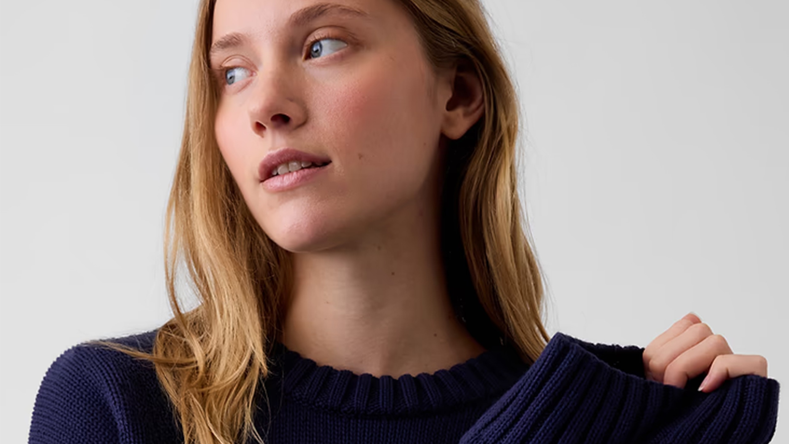 Model wearing a Gap sweater.