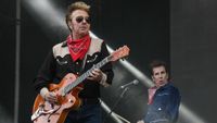 US singer and guitarist Brian Setzer (L) and US drummer Slim Jim Phantom, of the US band the Stray Cats, perform on stage during the 31st Eurockeennes rock music festival in Belfort, eastern France, on July 7, 2019.