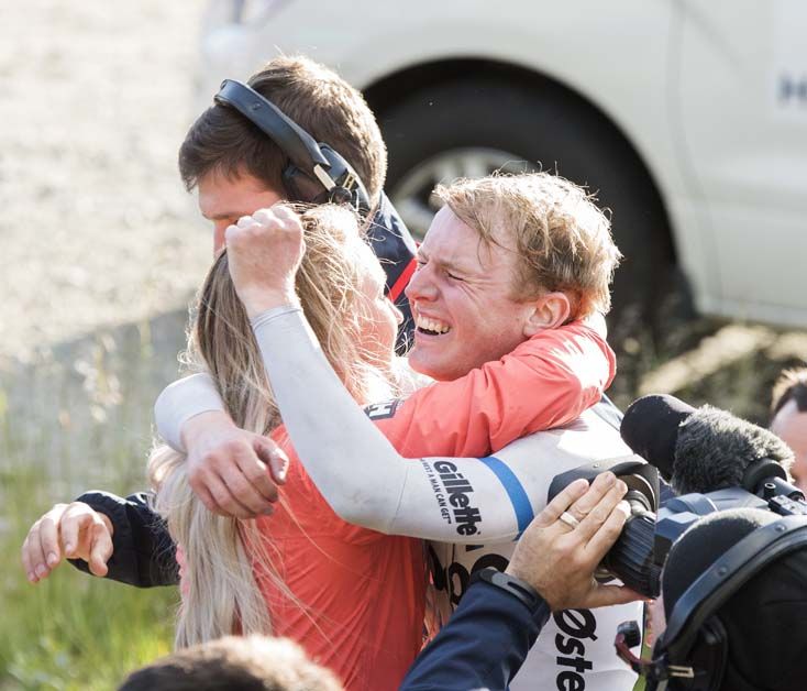 Stage winner August Jensen celebrates his win