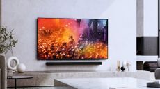 Sony Bravia 9 TV mounted on a wall, with Theatre Bar 9 soundbar underneath