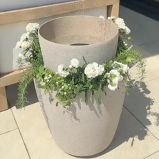 Finished water feature made from grey planters.