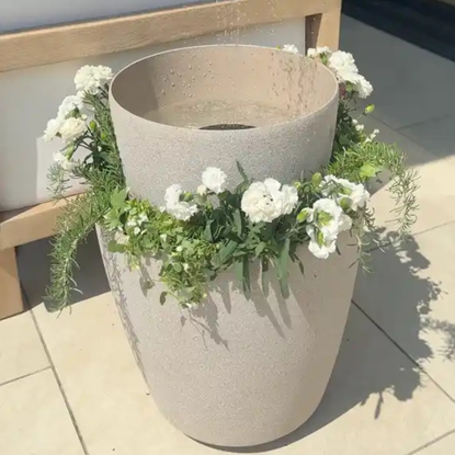 Finished water feature made from grey planters.