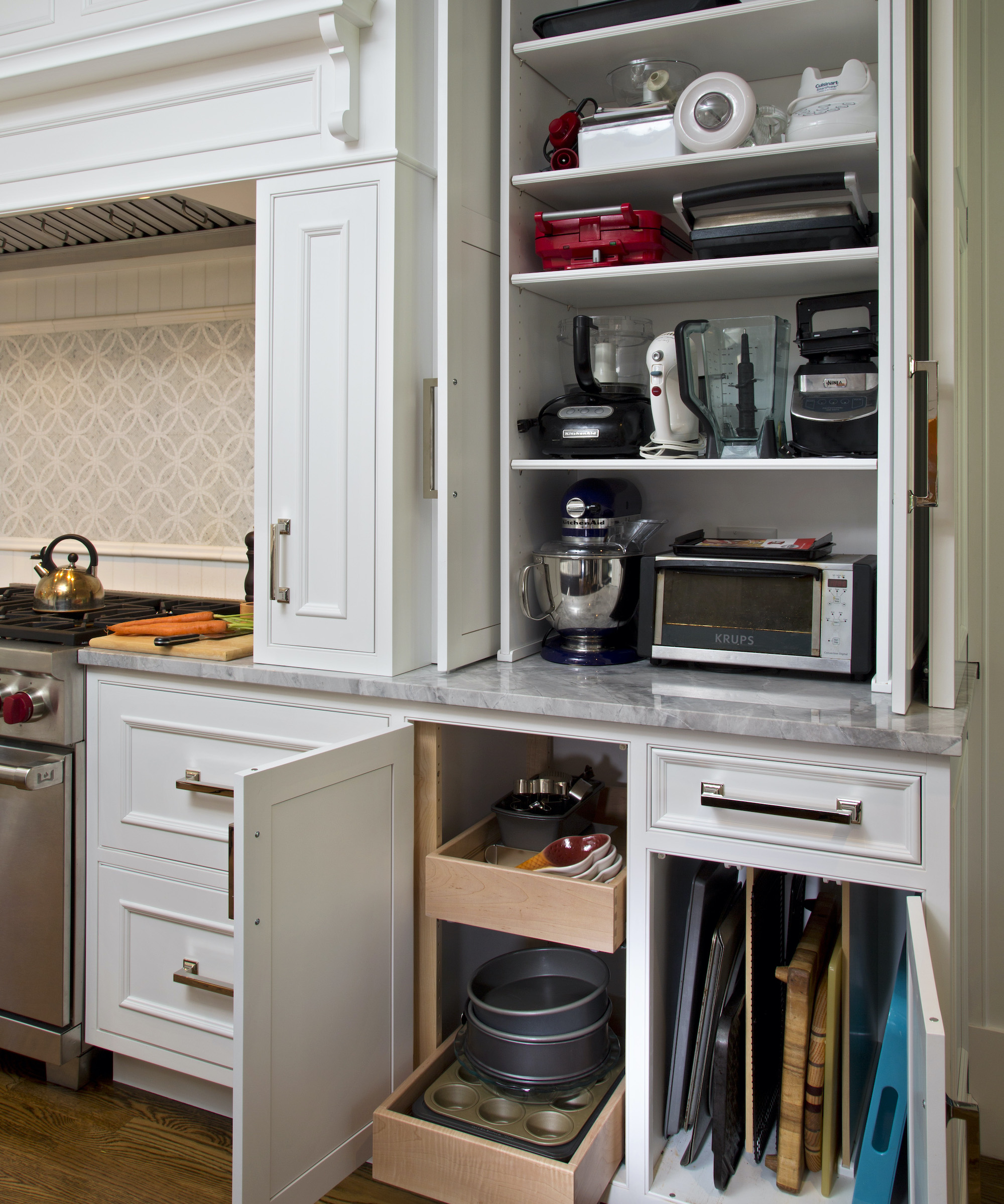 kitchen storage with doors open to show contents