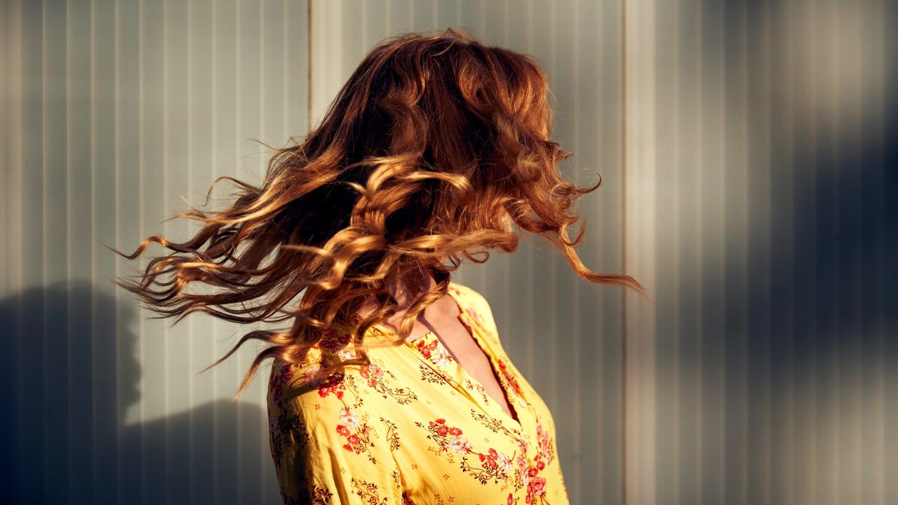 woman flipping hair