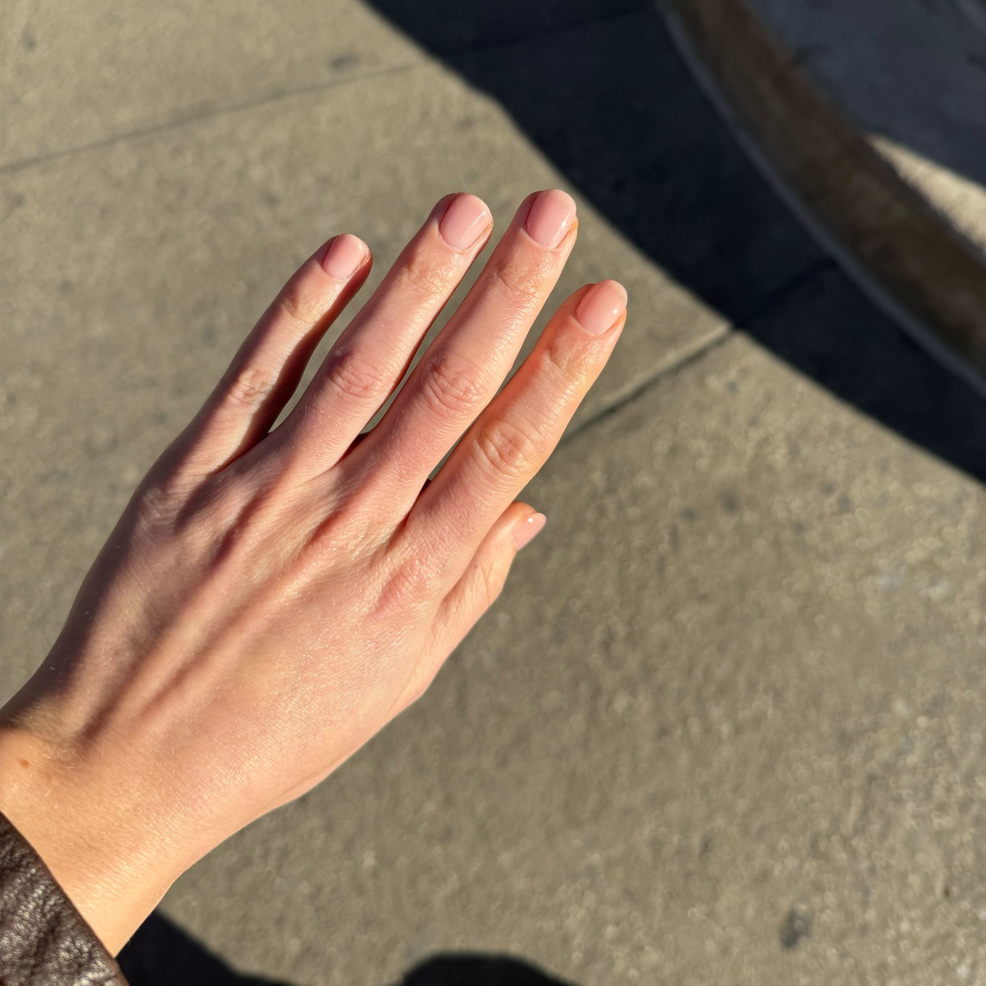 Photo of Jamie Schneider's nails one week after getting Japanese gel