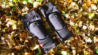 Fasthouse Hooper knee pad on autumn leaves