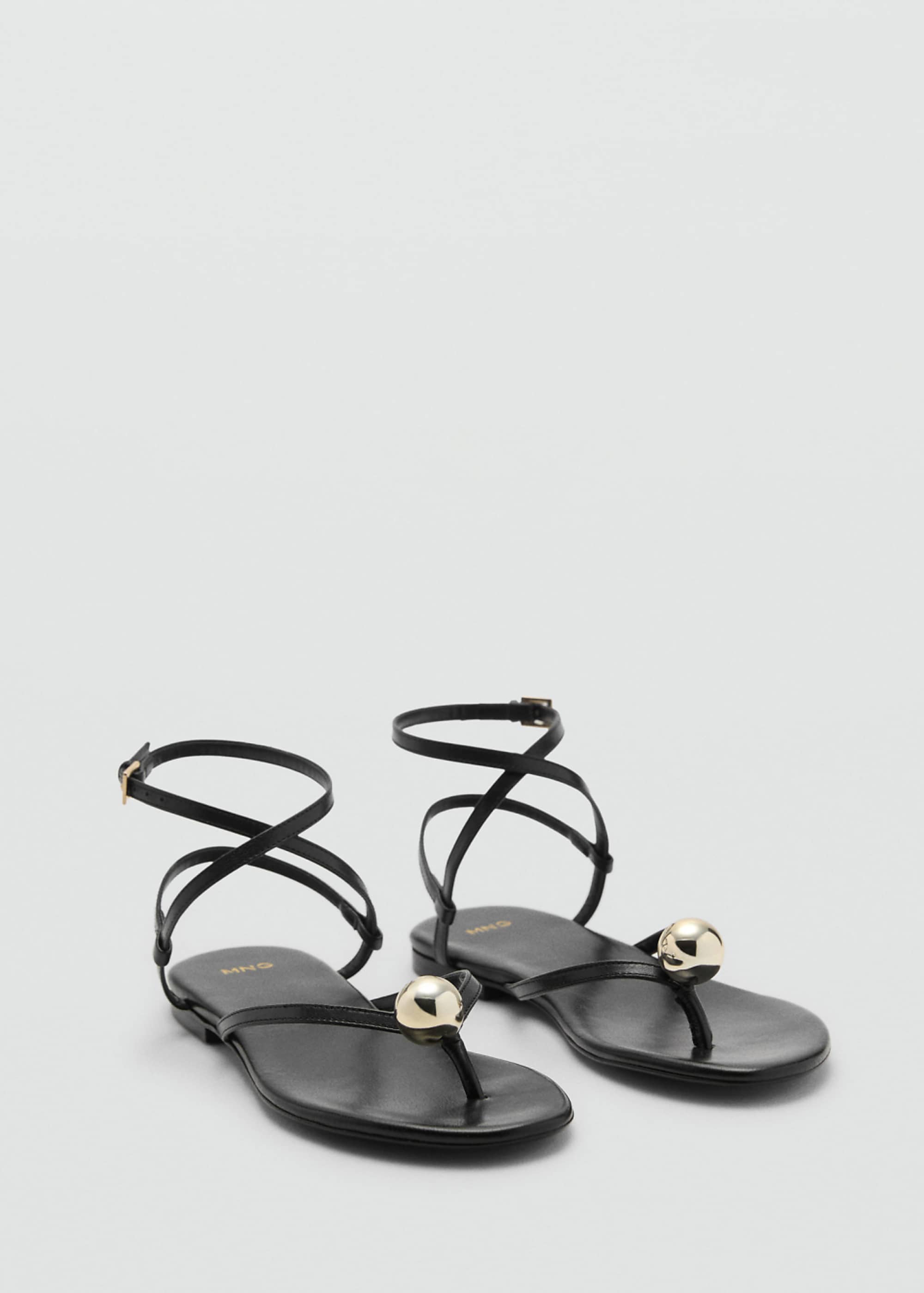 Mango Featuring Kaia Gerber Flat Leather Sandal With Cross Strap in Black