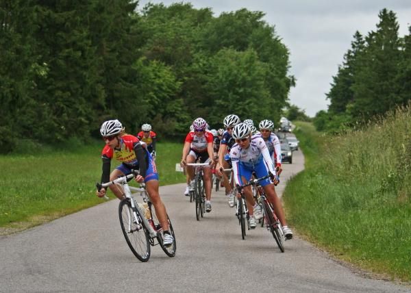 The lead group heads into a turn