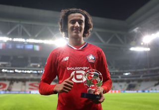 LILLE, FRANCE - NOVEMBER 05: Ayyoub Bouaddi of LOSC Lille poses for a photo after being awarded the PlayStation Player of the Match award at the end of the UEFA Champions League 2024/25 League Phase MD4 match between LOSC Lille and Juventus at Stade Pierre Mauroy on November 05, 2024 in Lille, France. (Photo by Julian Finney - UEFA/UEFA via Getty Images) Arsenal target