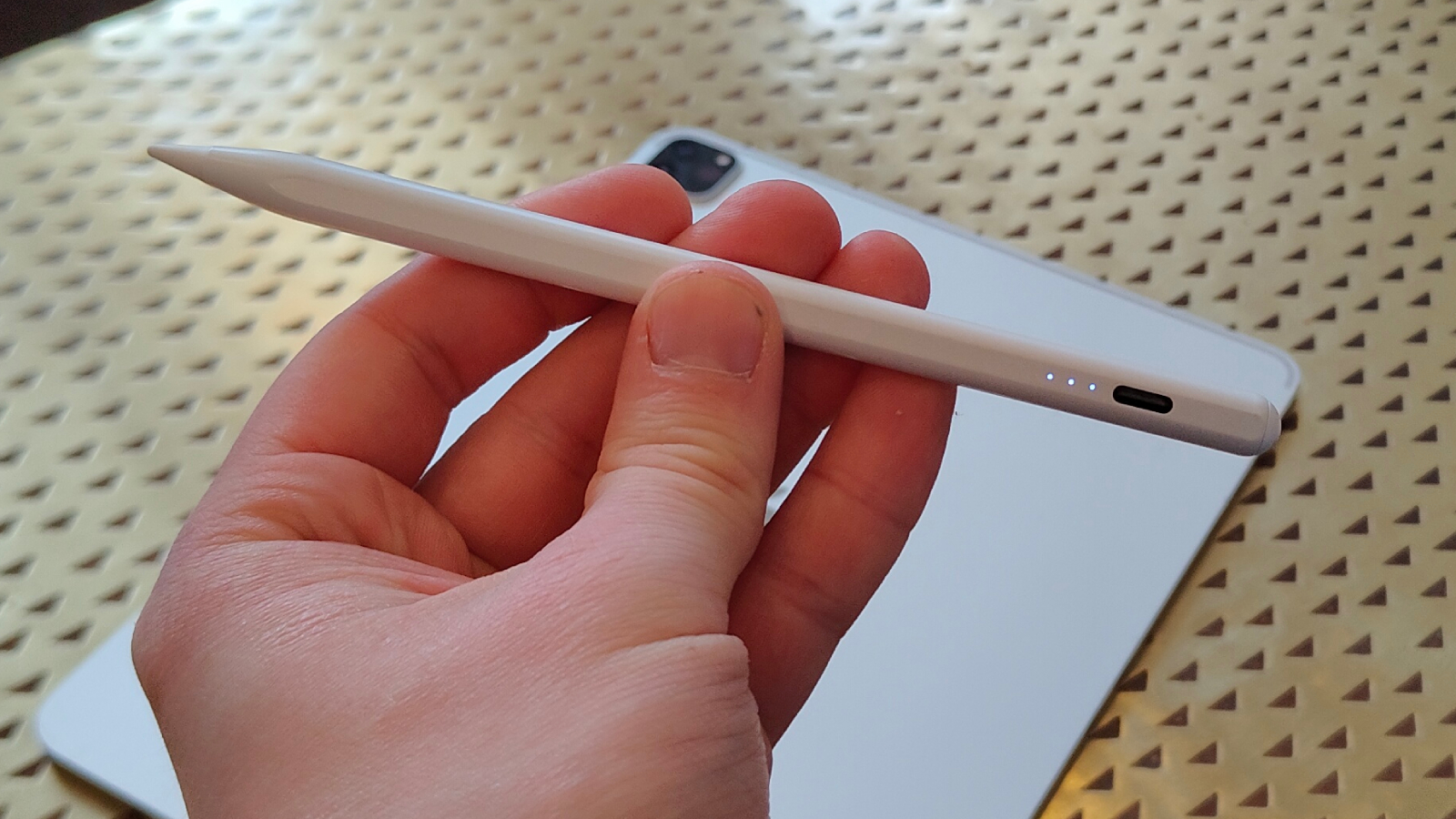 Meko stylus pen in a man's hand.