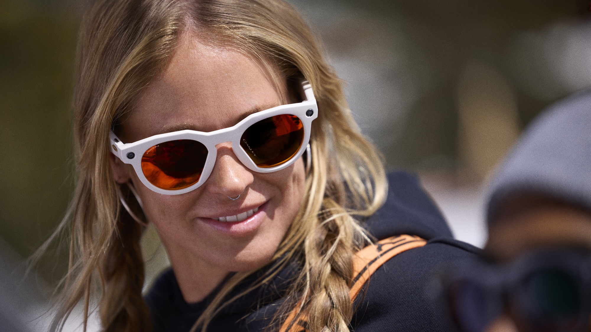 Oakley Meta HSTN glasses worn by a woman