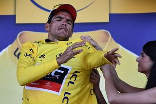 Greg van Avermaet pulls on the yellow jersey after stage 6