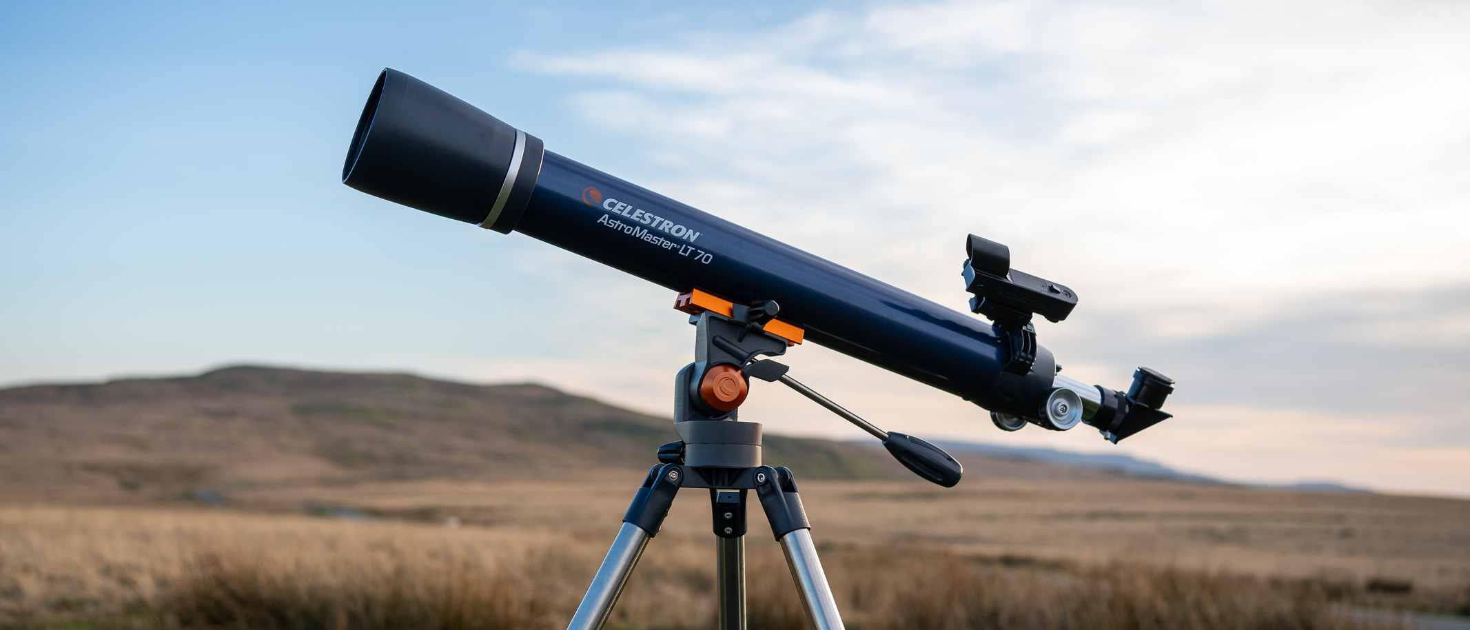 Celestron AstroMaster LT 70AZ in a field