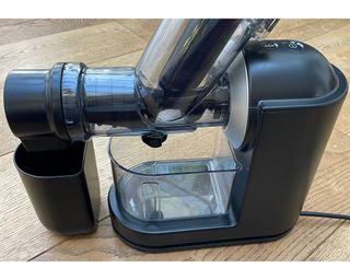 Philips Viva Masticating juicer assembled on wooden table