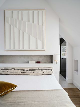 a niche over a bed in a modern bedroom