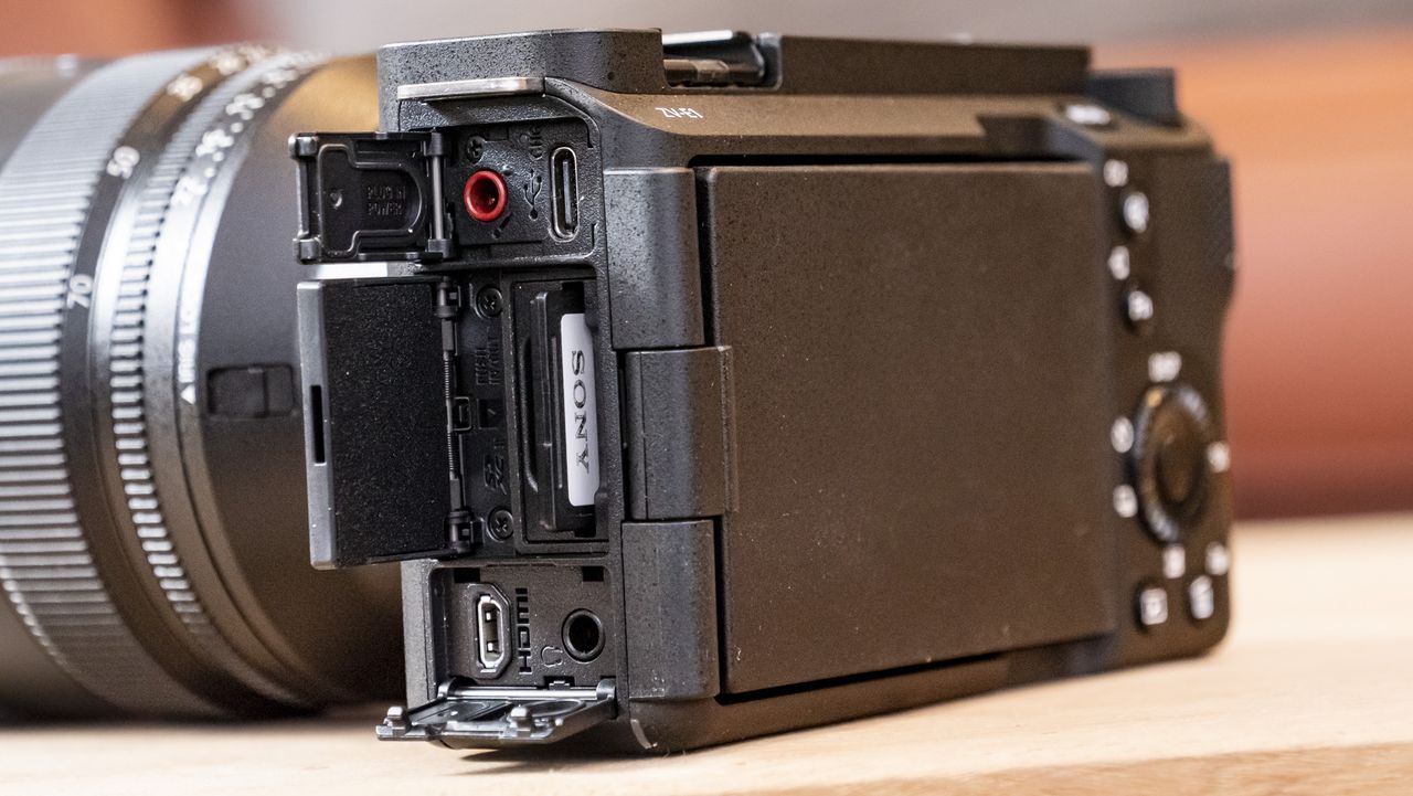 The Sony ZV-E1 camera sitting on a wooden table