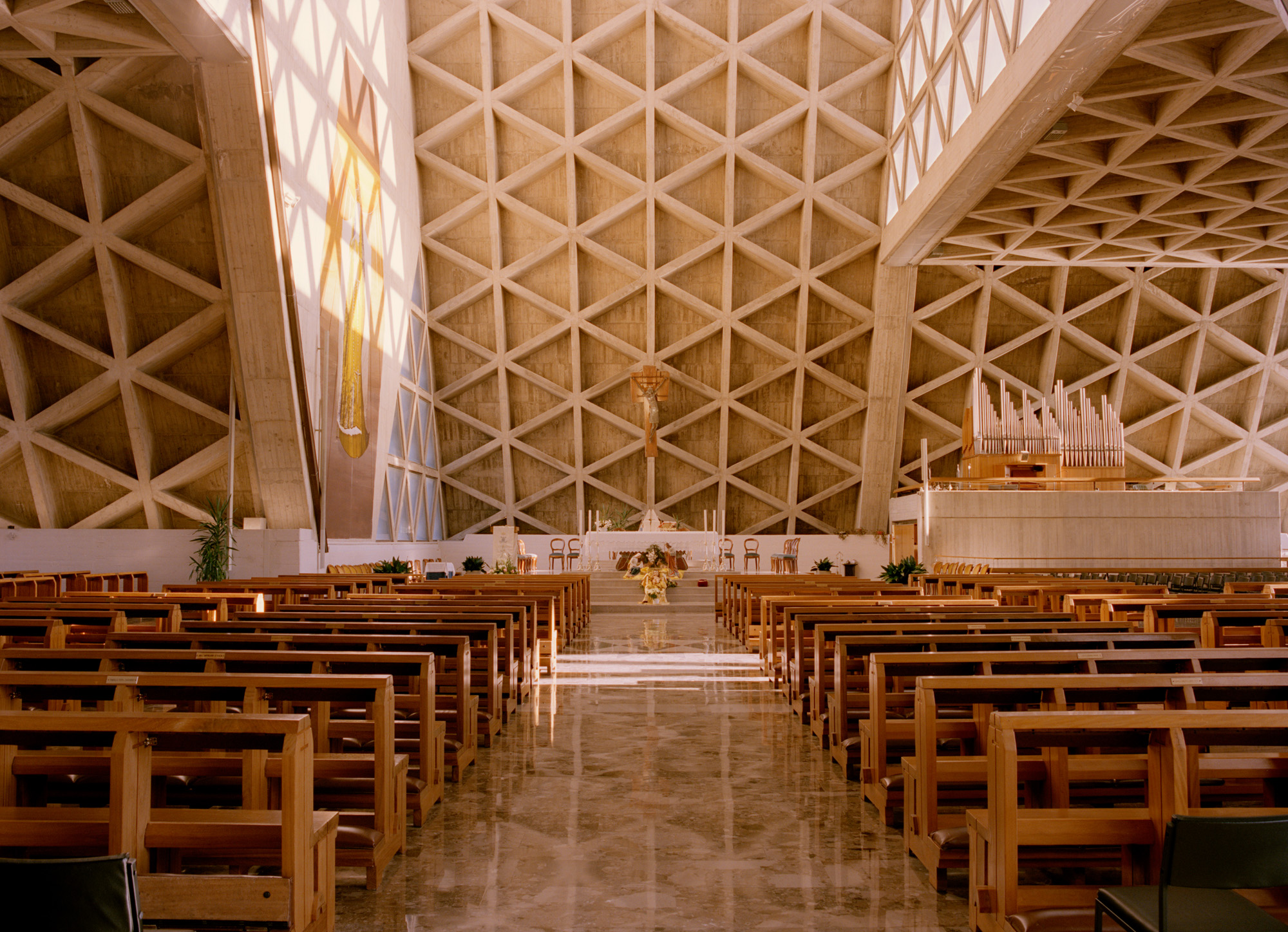 the sanctuary of Monte Grisa in Italy with its honeycomb concrete brutalist facade