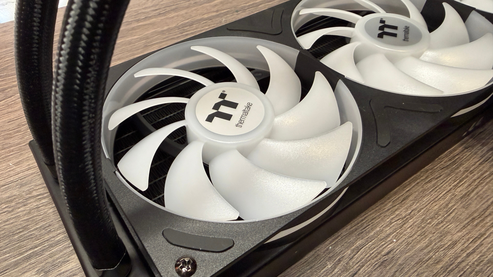 Thermaltake TH360 V3 Ultra ARGB Sync outside of a PC case with fans installed.