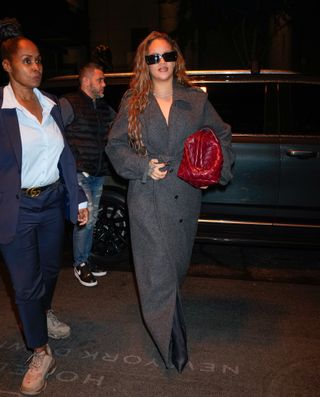 Celebrity autumn outfits: Rihanna wears a maxi coat and pointed-toe boots