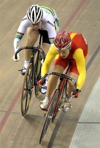 China's Shuang Guo gets the better of Australian Anna Meares in the sprint final.