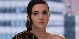 Katie Stevens as Jane Sloane in The Bold Type, looking concerned while dressed to the nines