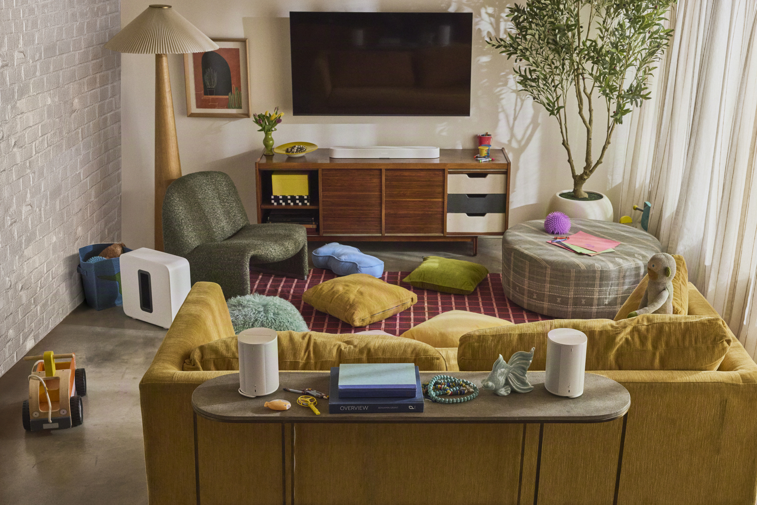 a comfortable living room with modern furniture and sonos new products