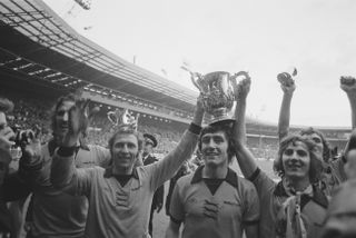 Wolves players celebrate their 1974 League Cup final win over Manchester City.