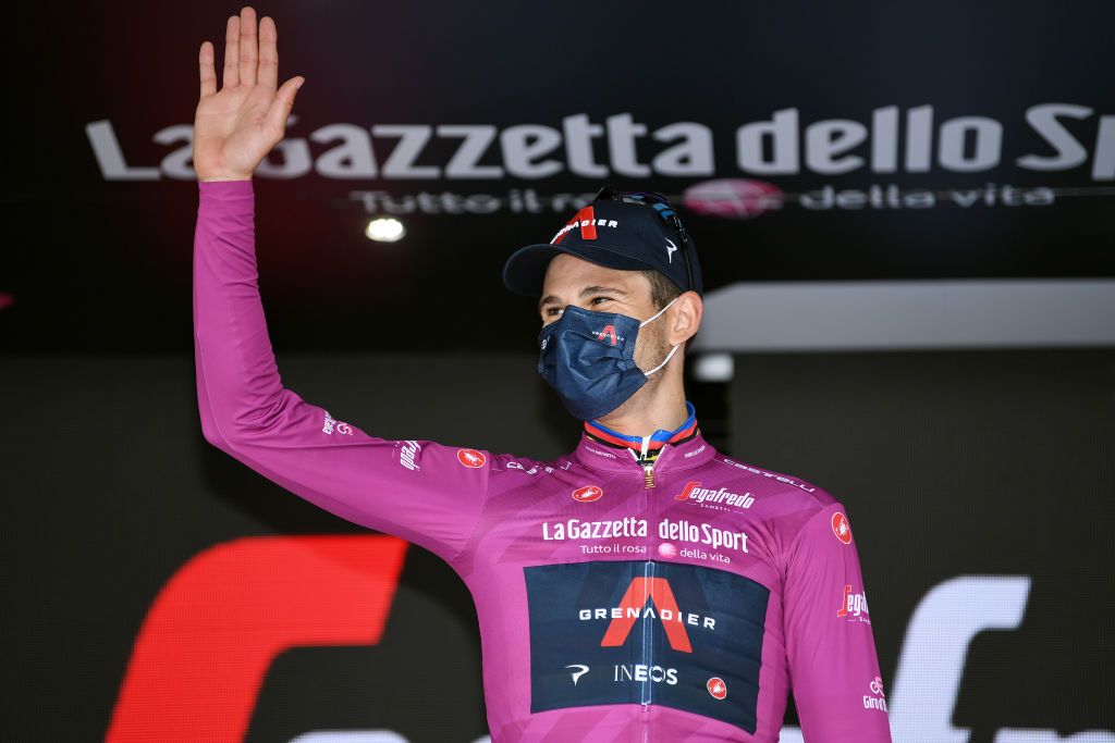 TURIN ITALY MAY 08 Filippo Ganna of Italy and Team INEOS Grenadiers Purple points jersey celebrates at podium during the 104th Giro dItalia 2021 Stage 1 a 86km Individual Time Trial stage from Torino to Torino Mask Covid safety measures ITT girodiitalia Giro on May 08 2021 in Turin Italy Photo by Tim de WaeleGetty Images
