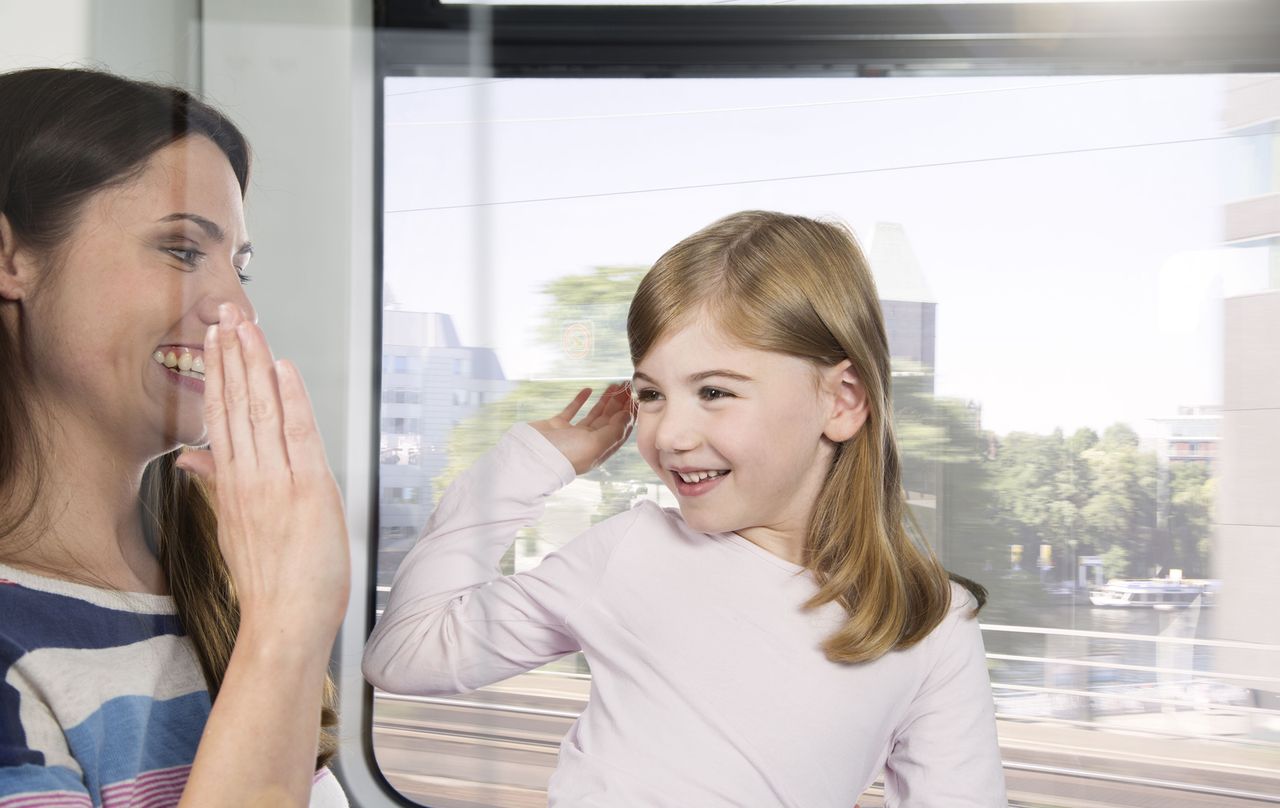 mum and daughter on train