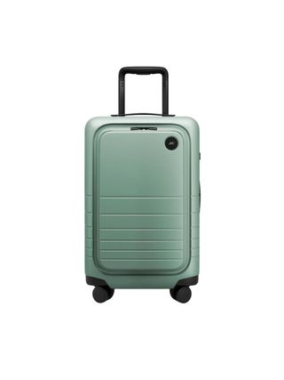 A green-hued carry-on suitecase features a stripy, textural structure.