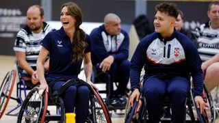 Kate Middleton laughing as she takes part in a wheelchair rugby training session