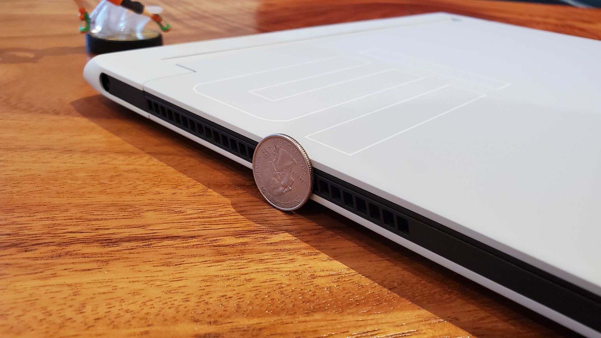 An Alienware x15 R2 gaming laptop on a wooden table
