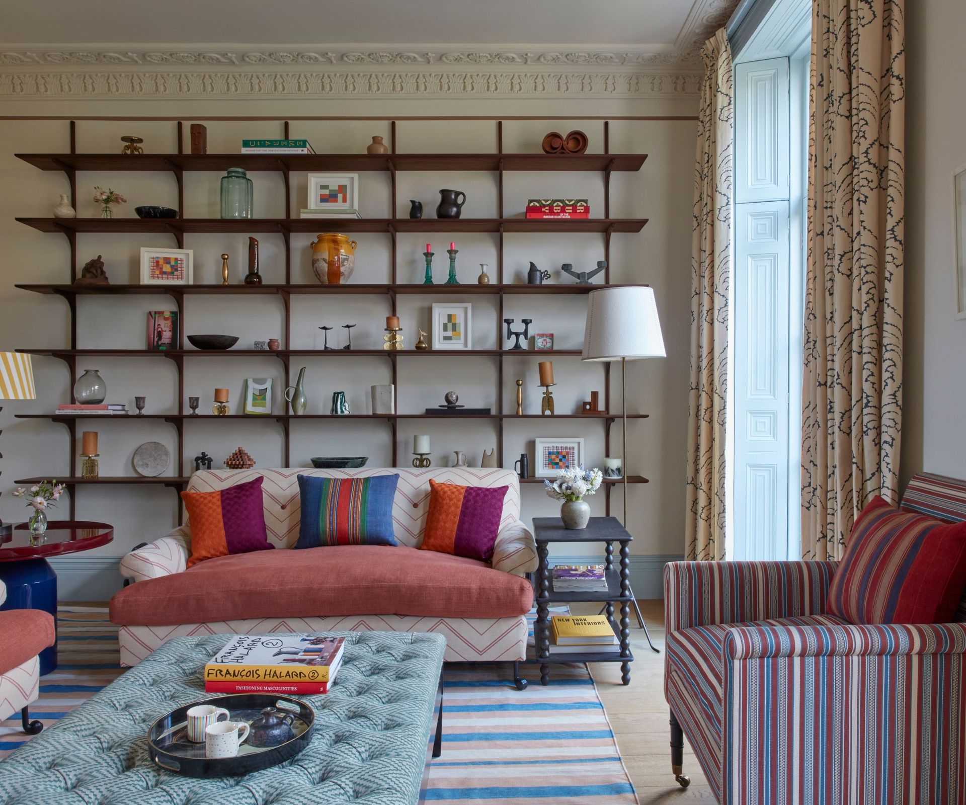 Living room with wall of shelving